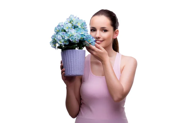 Jovem com vaso de flores isolado em branco — Fotografia de Stock