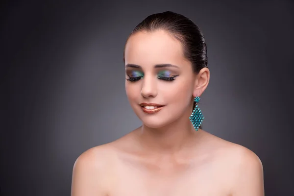 Beautiful woman showing off her jewellery in fashion concept — Stock Photo, Image