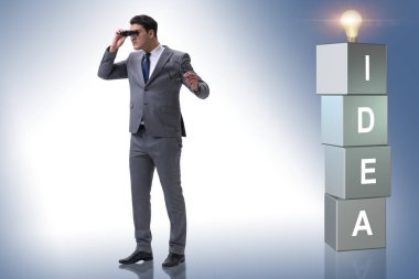 Parlak fikirler arayan iş adamı.