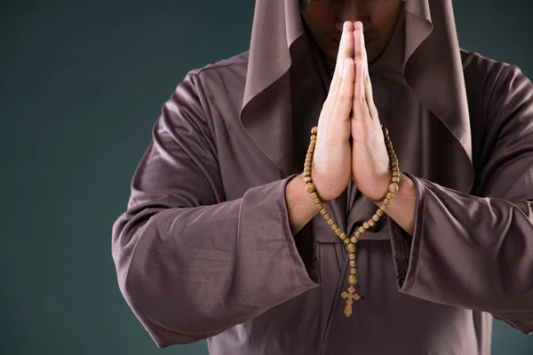 Monk in religious concept on gray background — Stock Photo, Image