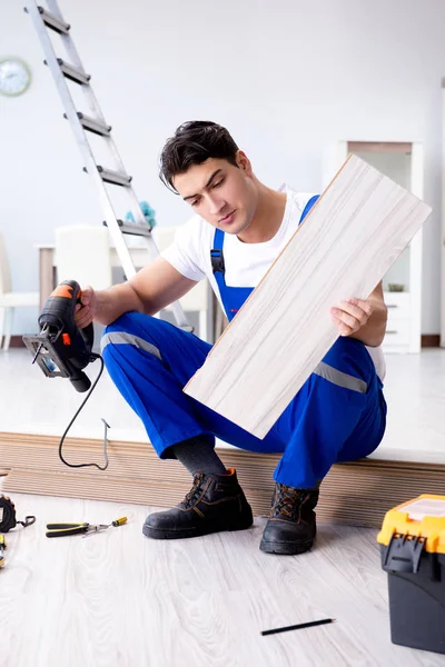 May laying laminate flooring at home — Stock Photo, Image