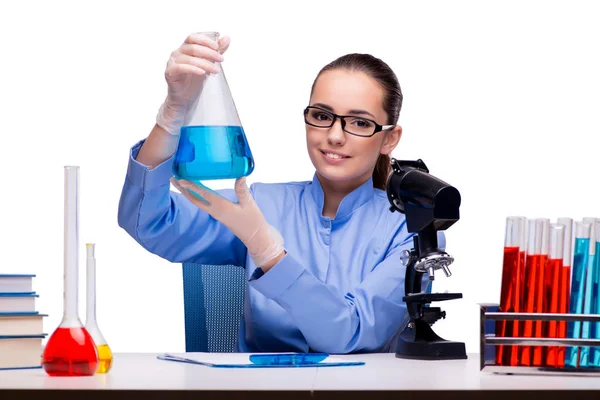 Lab chemist working with microscope and tubes — Stock Photo, Image