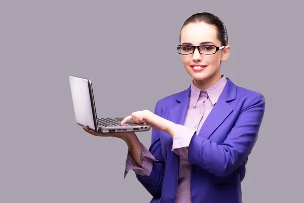 Businesswoman with laptop in business concept — Stock Photo, Image