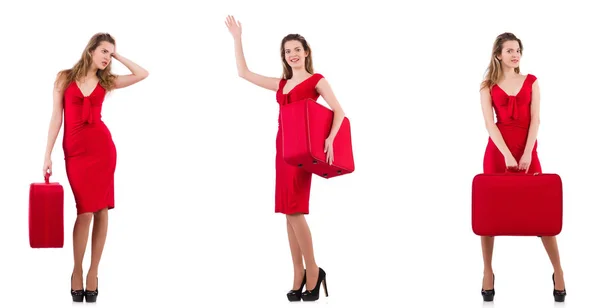 Jeune femme en robe rouge avec valise isolée sur blanc — Photo