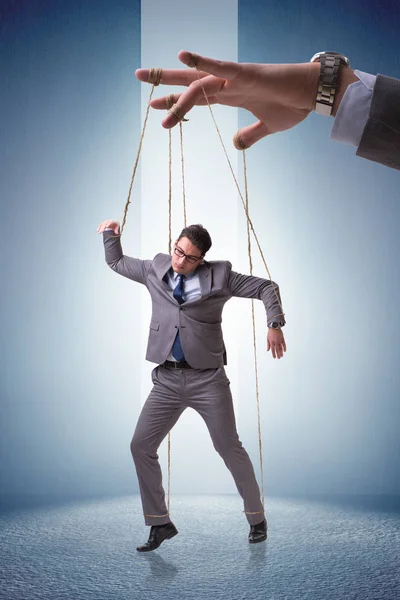 Businessman puppet being manipulated by boss — Stock Photo, Image