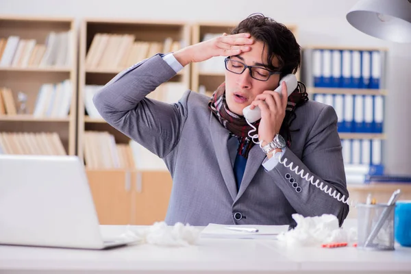 Sick businessman suffering from illness in the office — Stock Photo, Image