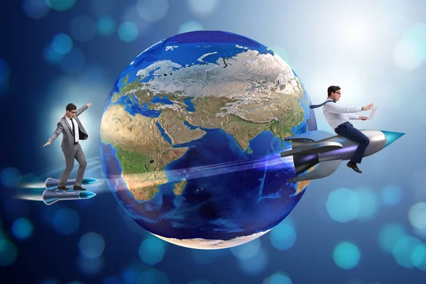 Two businessmen chasing around globe — Stock Photo, Image