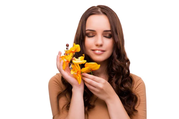 Hermosa mujer con flor de orquídea aislada en blanco —  Fotos de Stock