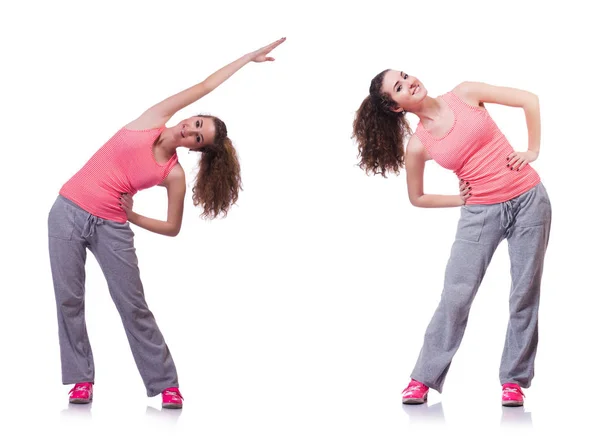 Joven hembra haciendo ejercicios en blanco —  Fotos de Stock