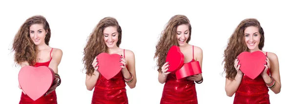 Woman in red dress with christmas gifts — Stock Photo, Image