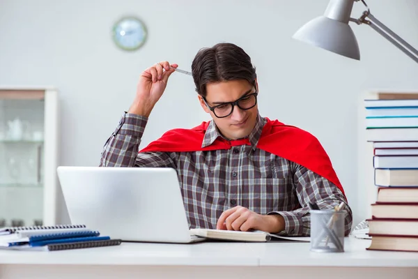 Super hero student with books studying for exams