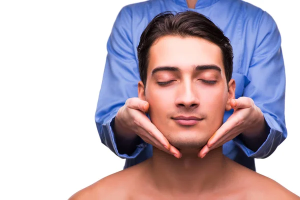 Adam beyaz izole masaj oturumu sırasında — Stok fotoğraf