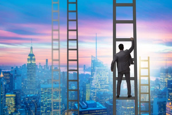 Young businessman climbing career ladder — Stock Photo, Image