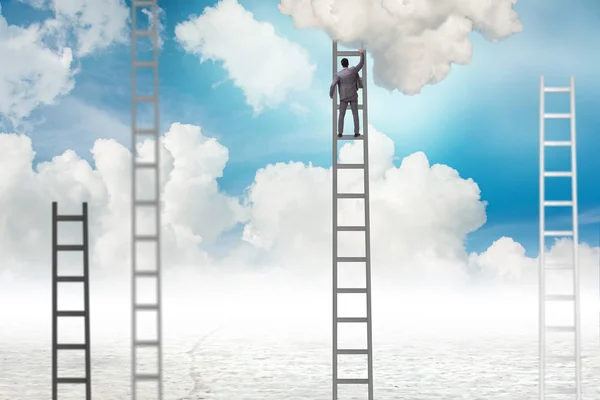 Businessman climbing stairs against the sky — Stock Photo, Image