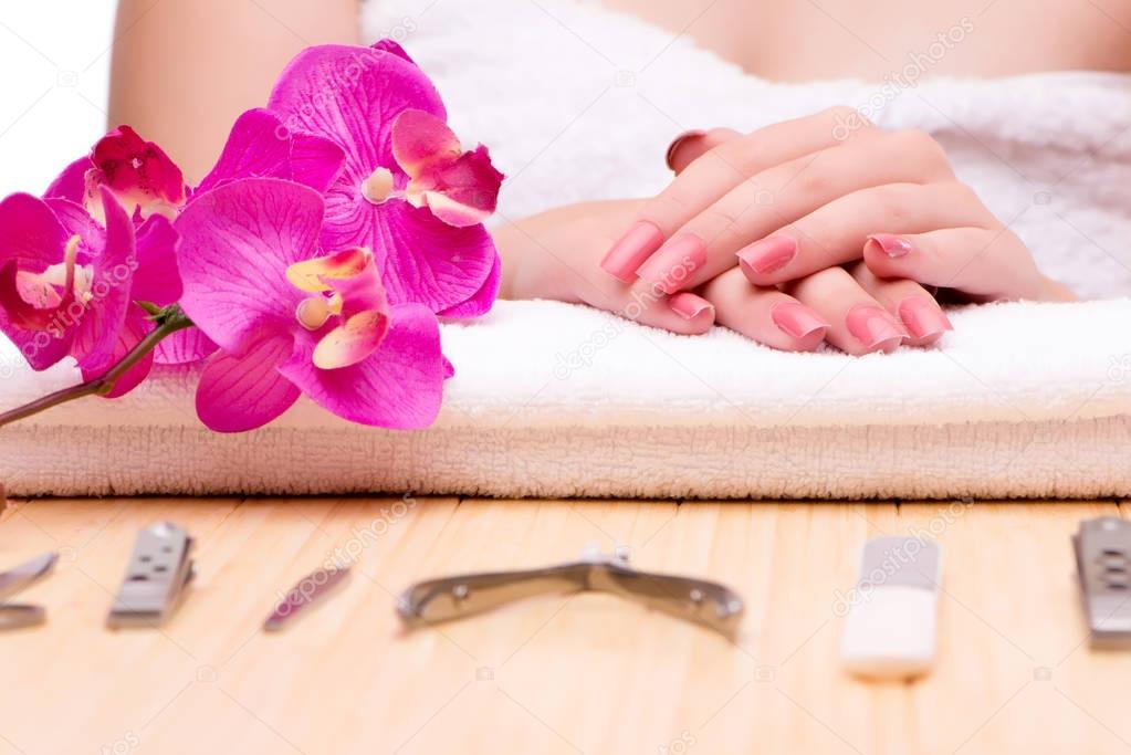 Woman hands during manicure session