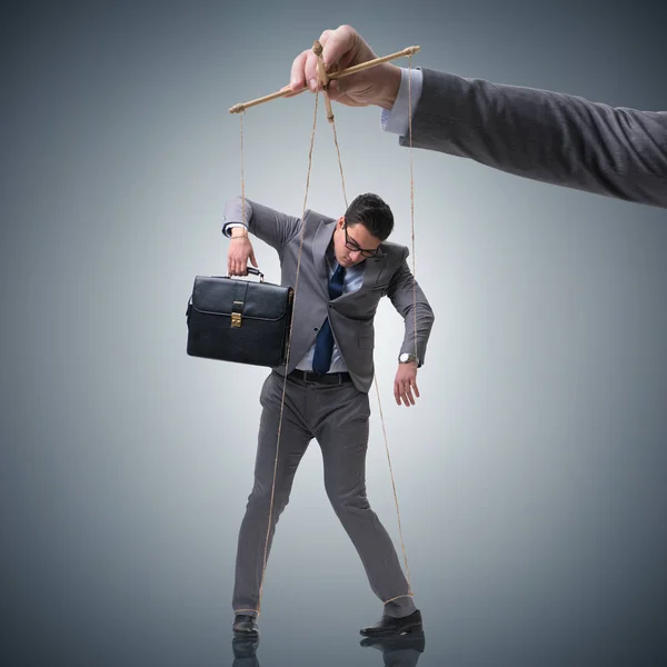 Businessman puppet being manipulated by boss — Stock Photo, Image