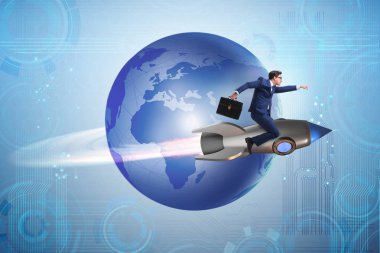 Küresel iş kavramı içinde roket üzerinde işadamı