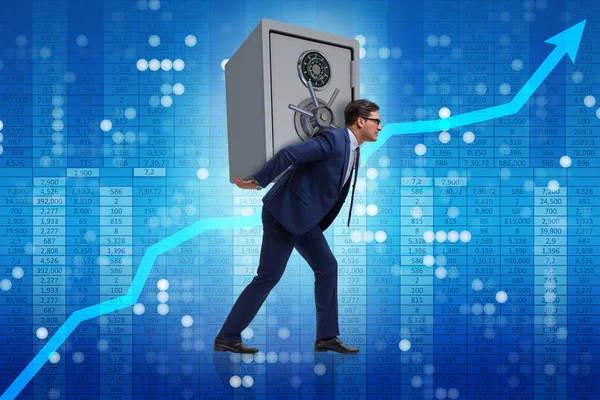 BUsinessman stealing metal safe from bank — Stock Photo, Image