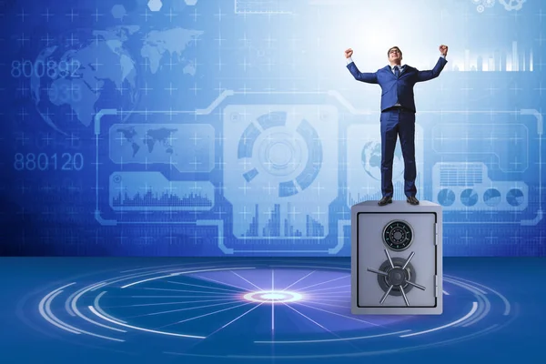 Businessman standing on top of safe — Stock Photo, Image