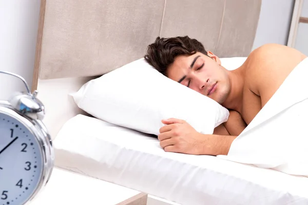 Young man having trouble waking up in the morning — Stock Photo, Image