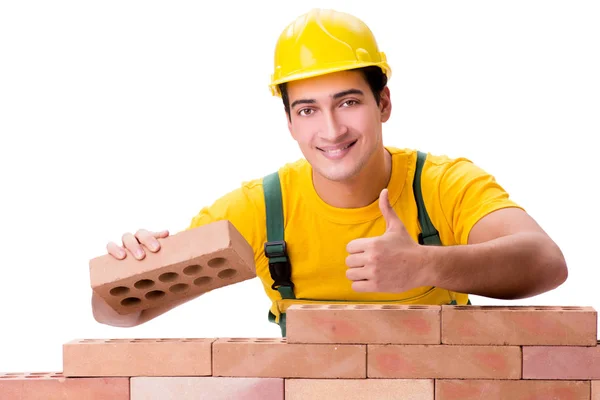 Hermoso trabajador de la construcción edificio pared de ladrillo — Foto de Stock