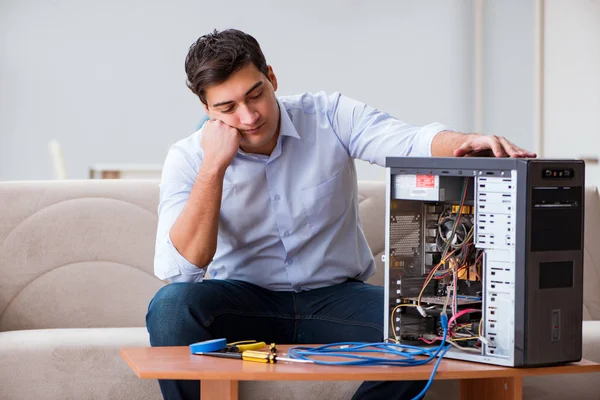 Frustrated man with broken pc computer