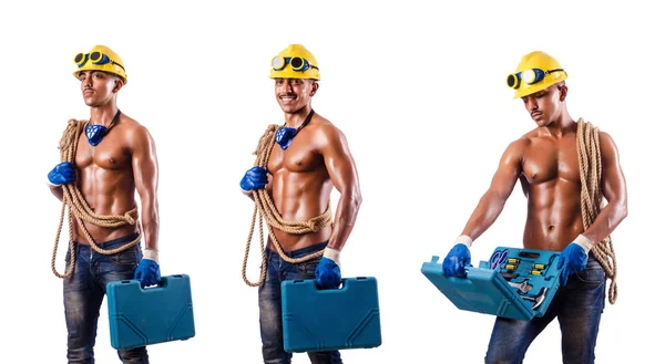 Muscular builder with tools isolated on white — Stock Photo, Image