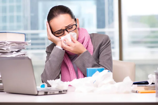 Young businesswoman sick in the office — Stock Photo, Image