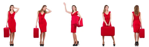 Νεαρή γυναίκα με κόκκινο φόρεμα με βαλίτσα που απομονώνονται σε λευκό — Φωτογραφία Αρχείου