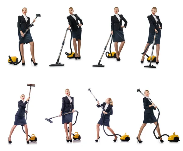 Businesswoman cleaning with vacuum cleaner on white — Stock Photo, Image