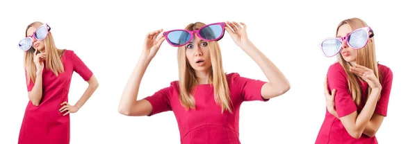 Tall model with giant sunglasses on white — Stock Photo, Image