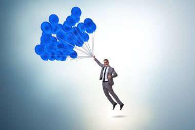 Balonla uçan iş adamı meydan okuma konseptinde