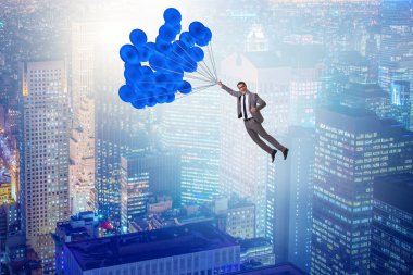 Balonla uçan iş adamı meydan okuma konseptinde