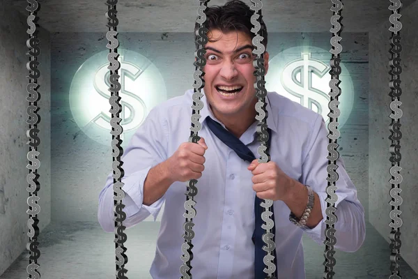 Un homme emprisonné avec des dollars — Photo