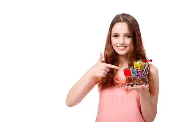 Mujer joven con carrito aislado en blanco — Foto de Stock