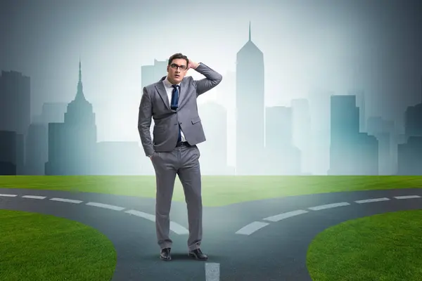 Businessman in difficult choice concept — Stock Photo, Image