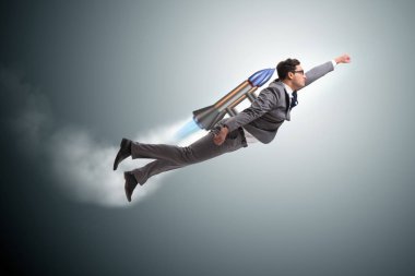 Roketle uçan adam iş konseptinde