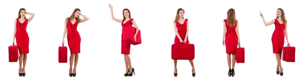 Νεαρή γυναίκα με κόκκινο φόρεμα με βαλίτσα που απομονώνονται σε λευκό — Φωτογραφία Αρχείου