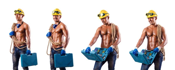 Muscular builder with tools isolated on white — Stock Photo, Image
