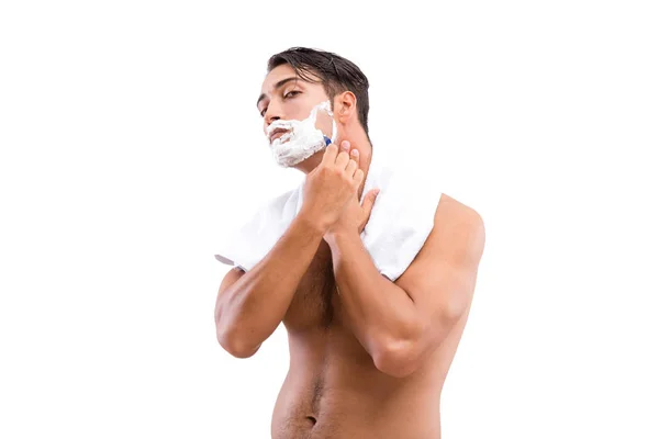 Красивий чоловік голиться ізольовано на білому — стокове фото