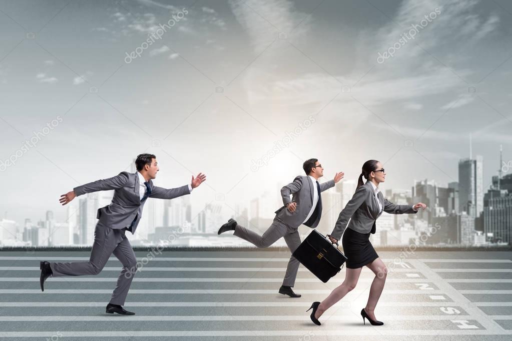 Businesspeople running in competition concept
