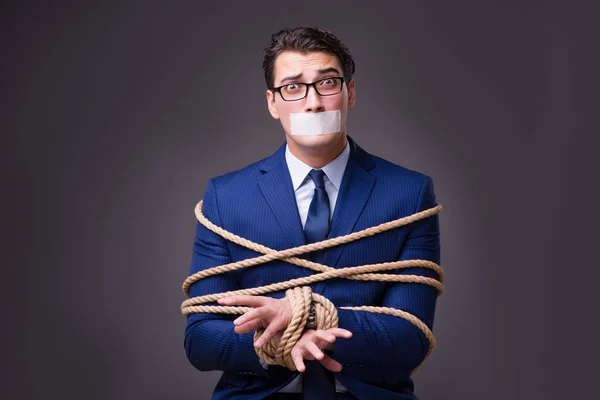 Empresário feito refém e amarrado com corda — Fotografia de Stock