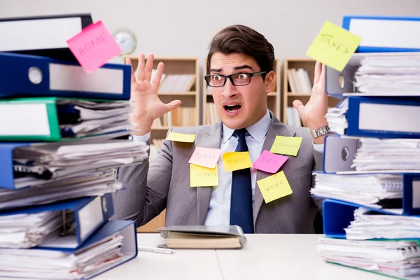 Businessman struggling with multiple priorities — Stock Photo, Image