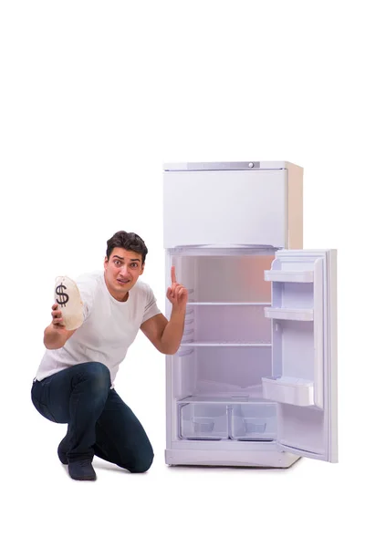 Uomo affamato in cerca di soldi per riempire il frigo — Foto Stock