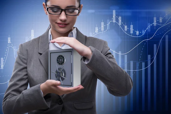 Businesswoman holding metal safe in security concept — Stock Photo, Image