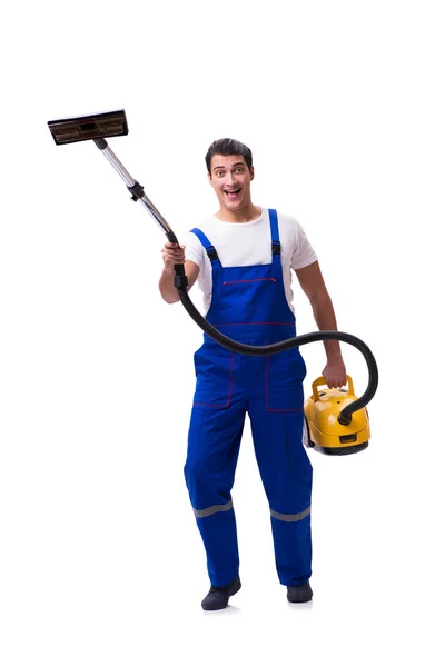 Man in overall doen vacuüm reiniging op wit — Stockfoto