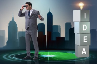 Parlak fikirler arayan iş adamı.