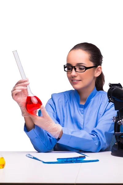 Young female doctor in lab isolated on white — Stock Photo, Image