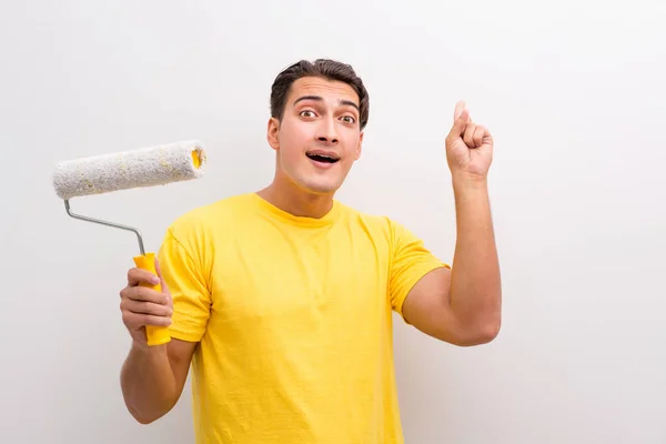 Man painting the wall in DIY concept — Stock Photo, Image