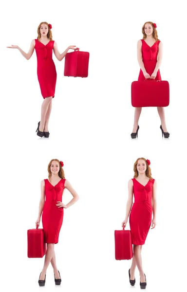 Young woman in red dress with suitcase isolated on white — Stock Photo, Image